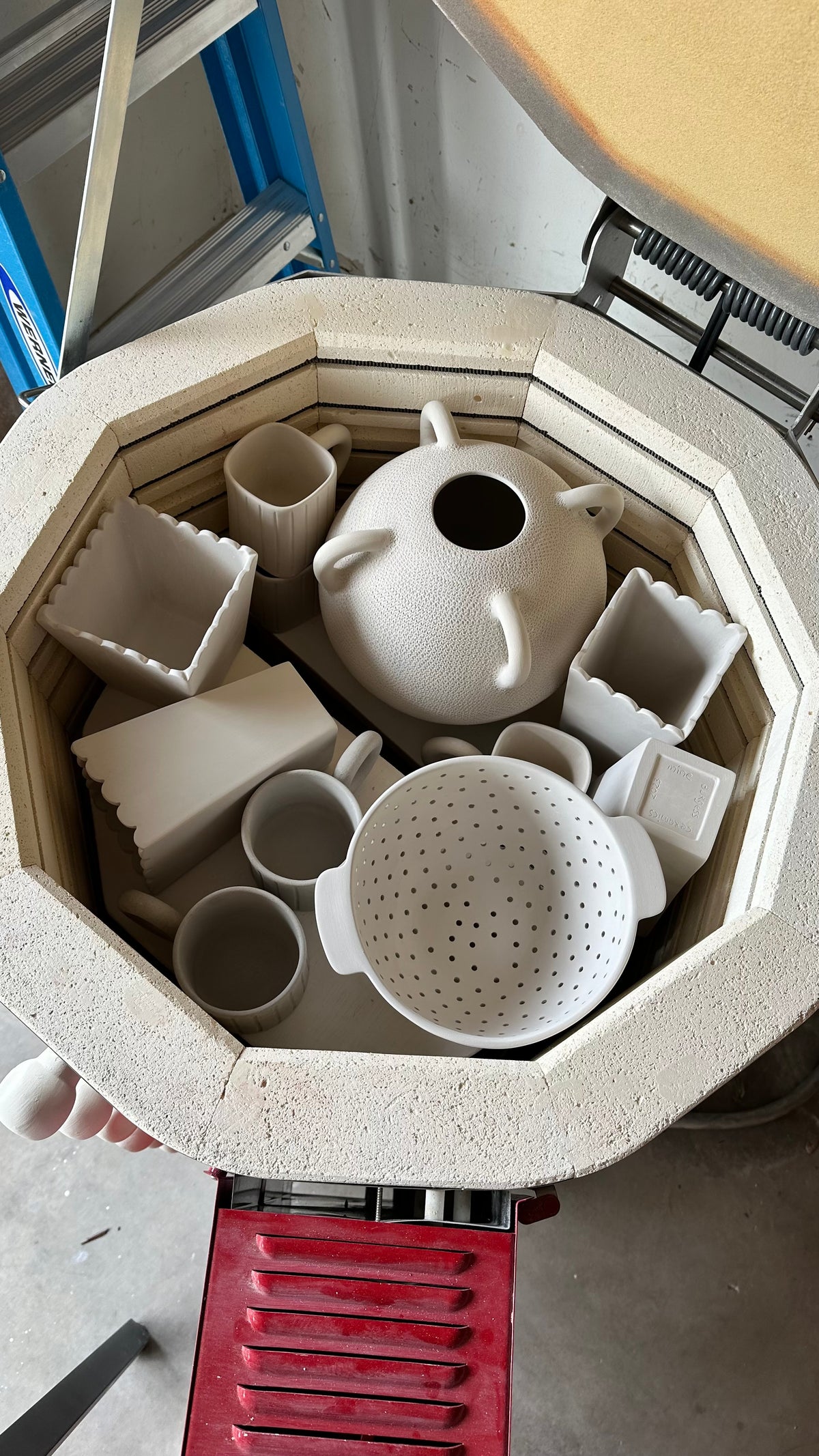 Handmade pots and vessels in the kiln