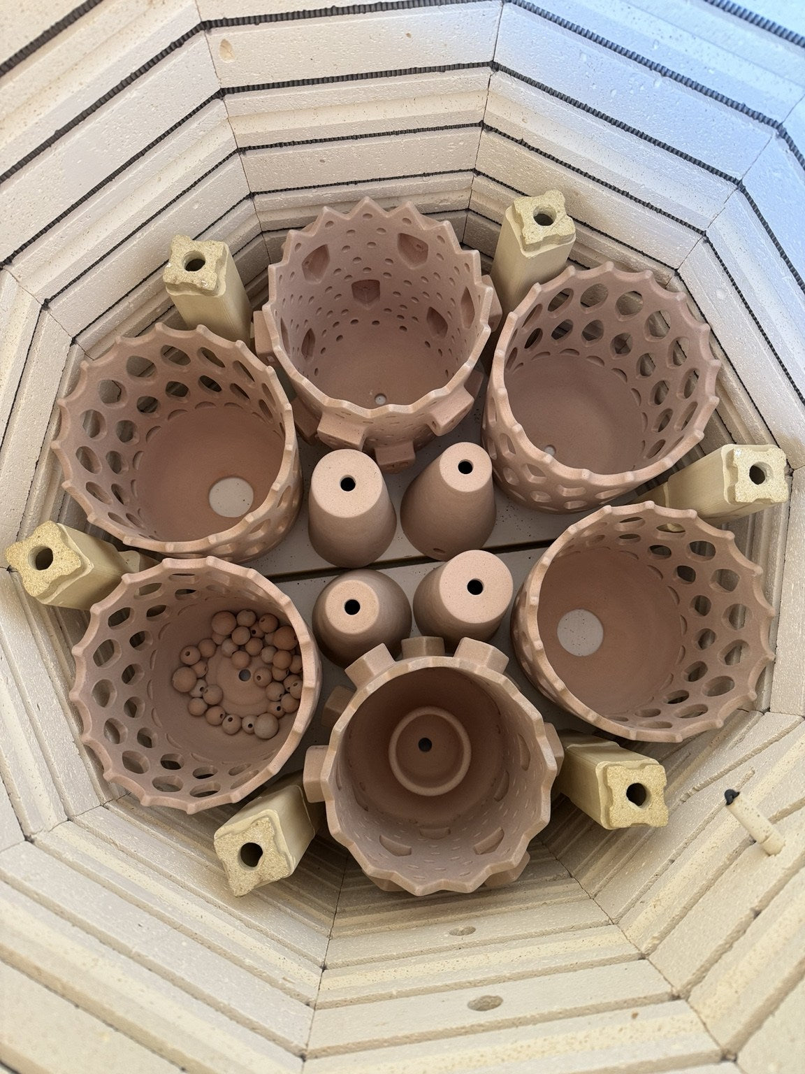 Flower detailed ceramics in the kiln
